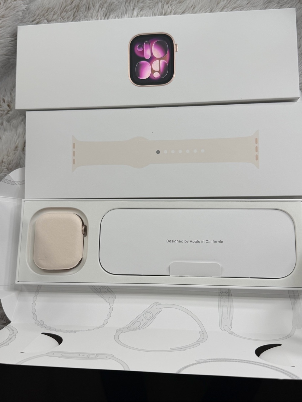 Apple Watch 46 mm with Pink Sand Sport Band and Case.
